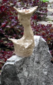 baby bird sculpture in Buffalo garden