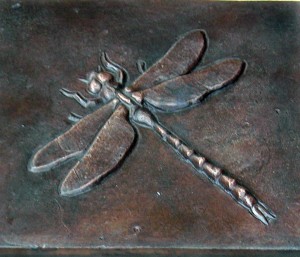 dragonfly tile in Buffalo garden