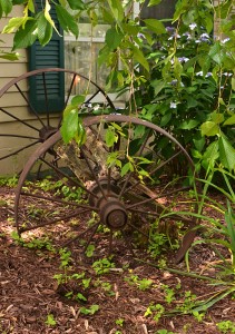 metal wagon wheels as garden art Lockport