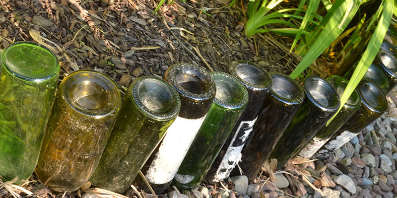 wine bottles form garden border