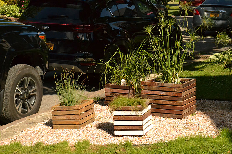 planters at Loomis home on Open Gardens