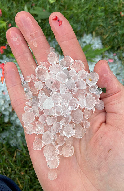 hand holding hail in Snyder NY
