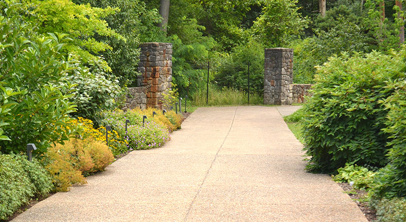 original driveway with gardens and pillars at Graycliff in Derby NY