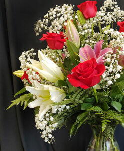 lilies and roses in flower arrangement at Mischler's in Williamsville NY