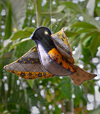 bird made by refugee women artisans at Buffalo and Erie County Botanical Gardens